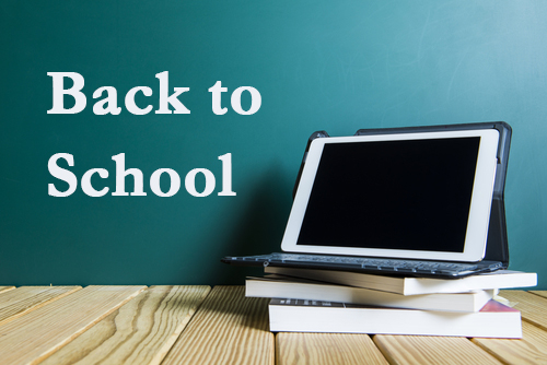 Empty tablet pc with books, technology and education